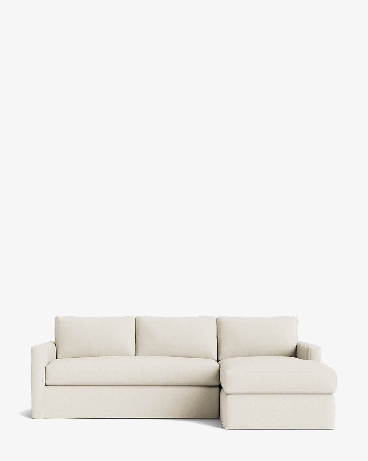 The Macy Slipcover Chaise Sectional 101 is a modern, light beige customizable sofa with three back cushions and a right-side chaise lounge, shown against a plain white background by McGee & Co.