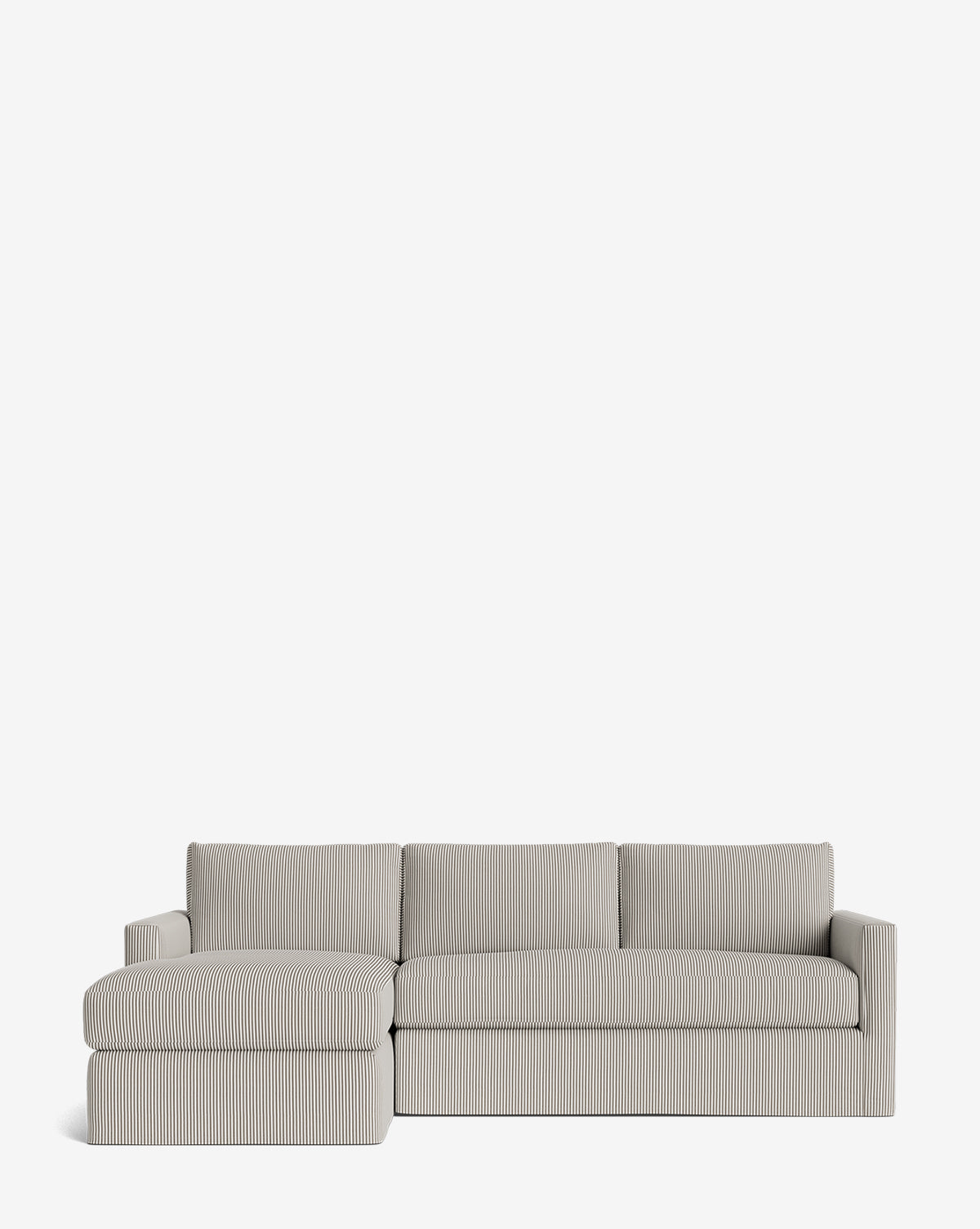 The Macy Slipcover Chaise Sectional 101 is a modern, light gray piece with subtle vertical stripes, a left-facing chaise, and three back cushions, shown on a plain white background by McGee & Co.