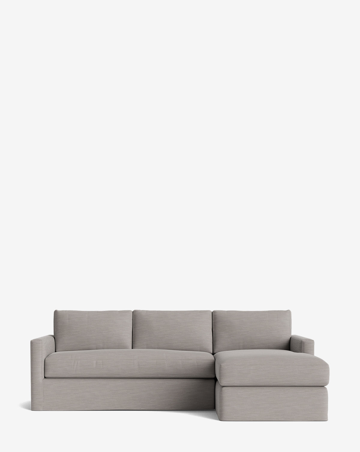 The Macy Slipcover Chaise Sectional 101 is a modern light gray customizable sofa with clean lines, three seat cushions, straight arms, and a right-facing chaise lounge, shown against a plain white background by McGee & Co.