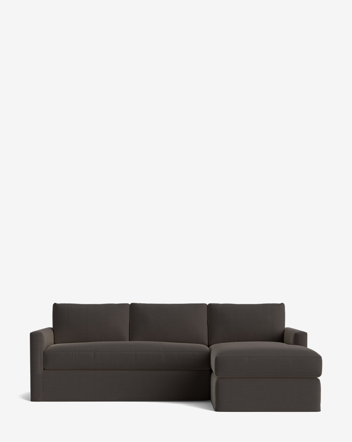 The Macy Slipcover Chaise Sectional 101 is a dark gray, modern sofa with three seat cushions and a right-side chaise, set against a plain white background by McGee & Co.