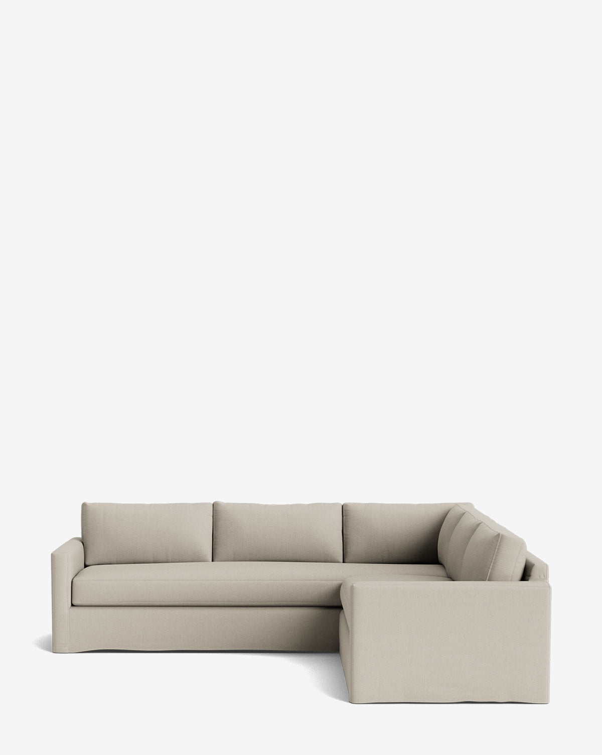 A Macy Slipcover L Sectional 108 in beige with clean lines and three seat cushions, shown on a plain white background. This customizable sectional includes a right-facing chaise lounge for versatile comfort by McGee & Co.