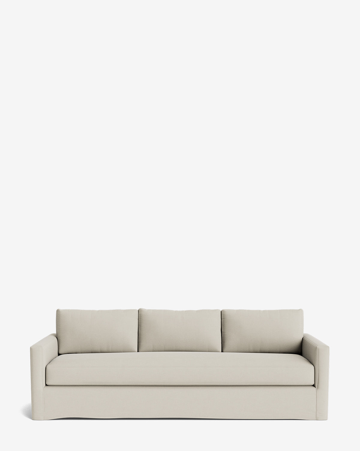The Macy Slipcover Sofa (84-96) is a modern, light beige sofa with straight arms, three seat cushions, and three back cushions in a clean, minimalist design against a plain white background by McGee & Co.