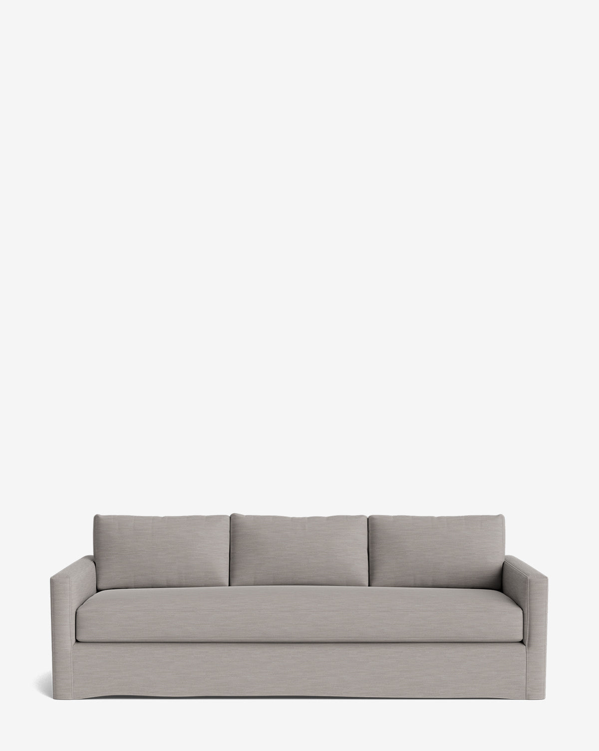 The Macy Slipcover Sofa (84-96) is a modern, minimalist light gray deep sofa with three back cushions and straight armrests, shown against a plain white background by McGee & Co.