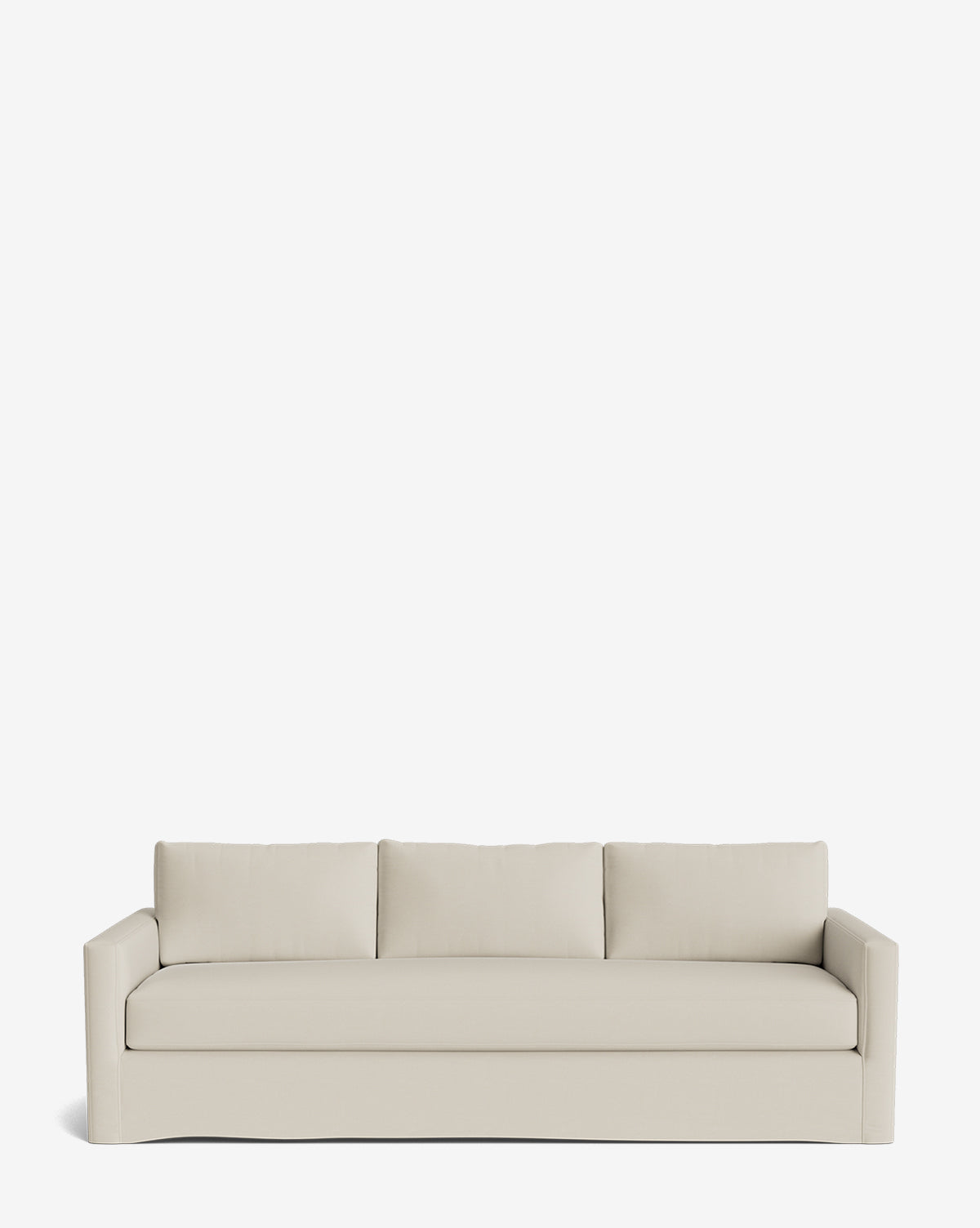 The Macy Slipcover Sofa (84-96) is a modern, customizable three-seat sofa with straight arms and light beige upholstery, shown against a plain white background by McGee & Co.
