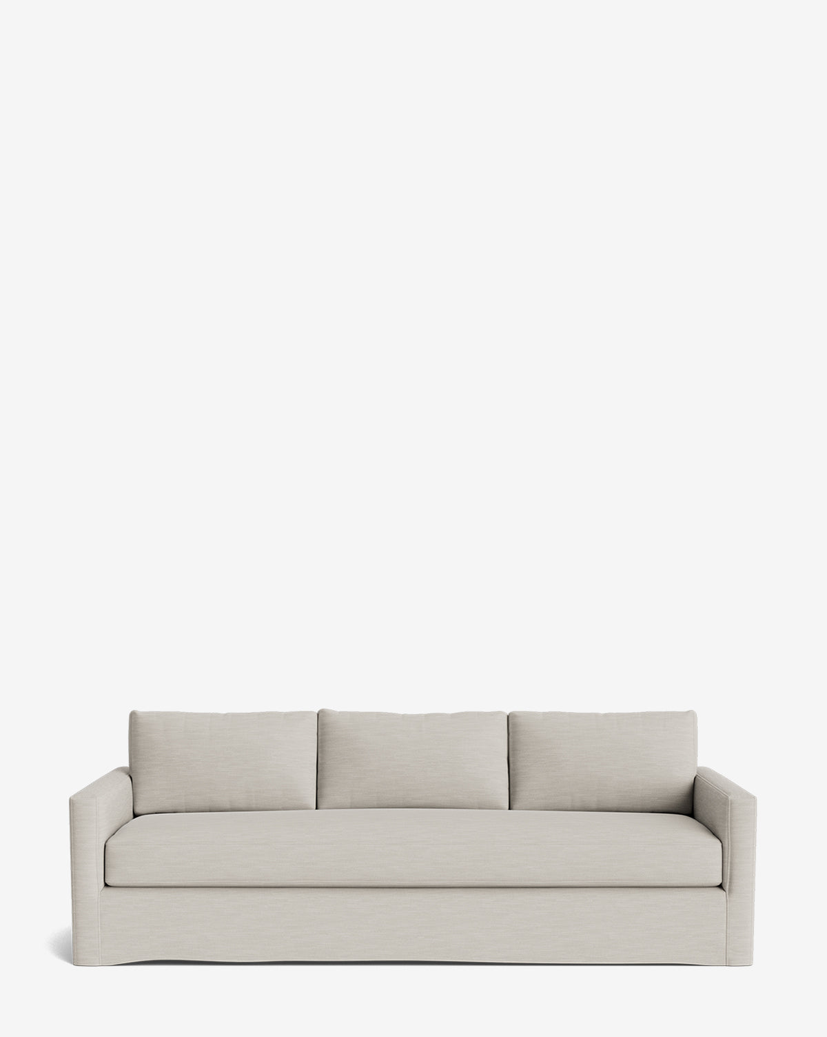 The Macy Slipcover Sofa (84-96) is a modern, light beige deep sofa with clean lines, straight arms, and three back cushions, displayed against a plain white background by McGee & Co.