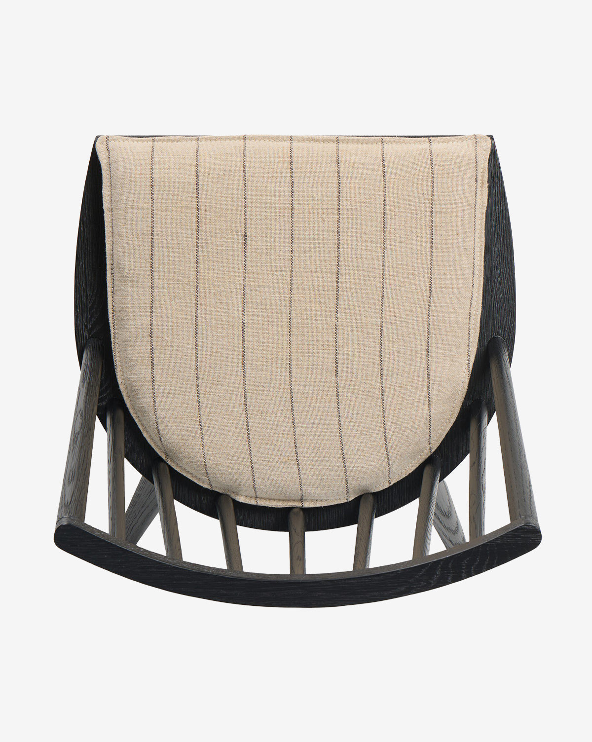 The Madison Dining Chair, with its black wooden frame and beige cushion accented by thin vertical stripes, brings contemporary elegance to any space when viewed from above, by McGee & Co.