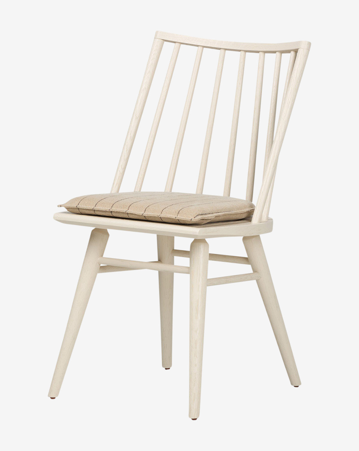 The Madison Dining Chair is a minimalist, Scandinavian-inspired oak chair with a light finish, slatted backrest, angled legs, and a thin beige seat cushion by McGee & Co.