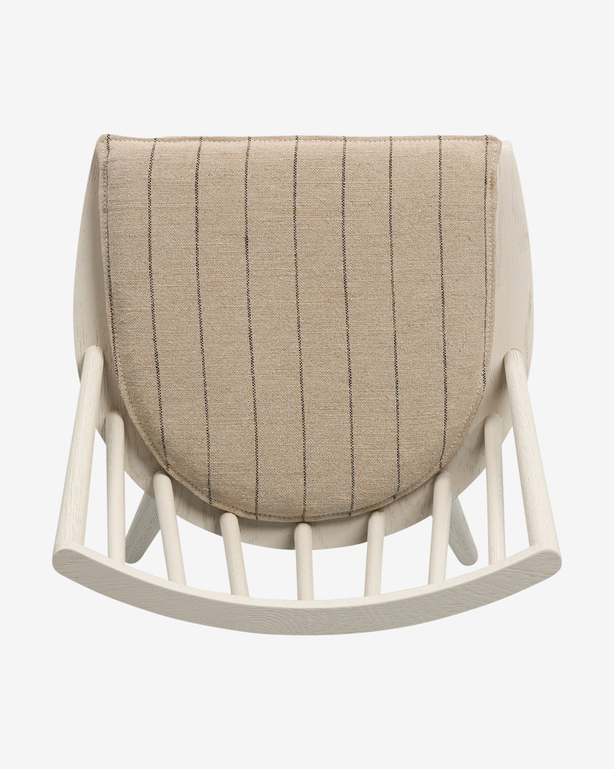 The Madison Dining Chair features a contemporary curved light wooden frame and a beige upholstered backrest with thin vertical stripes, shown from an overhead view by McGee & Co.