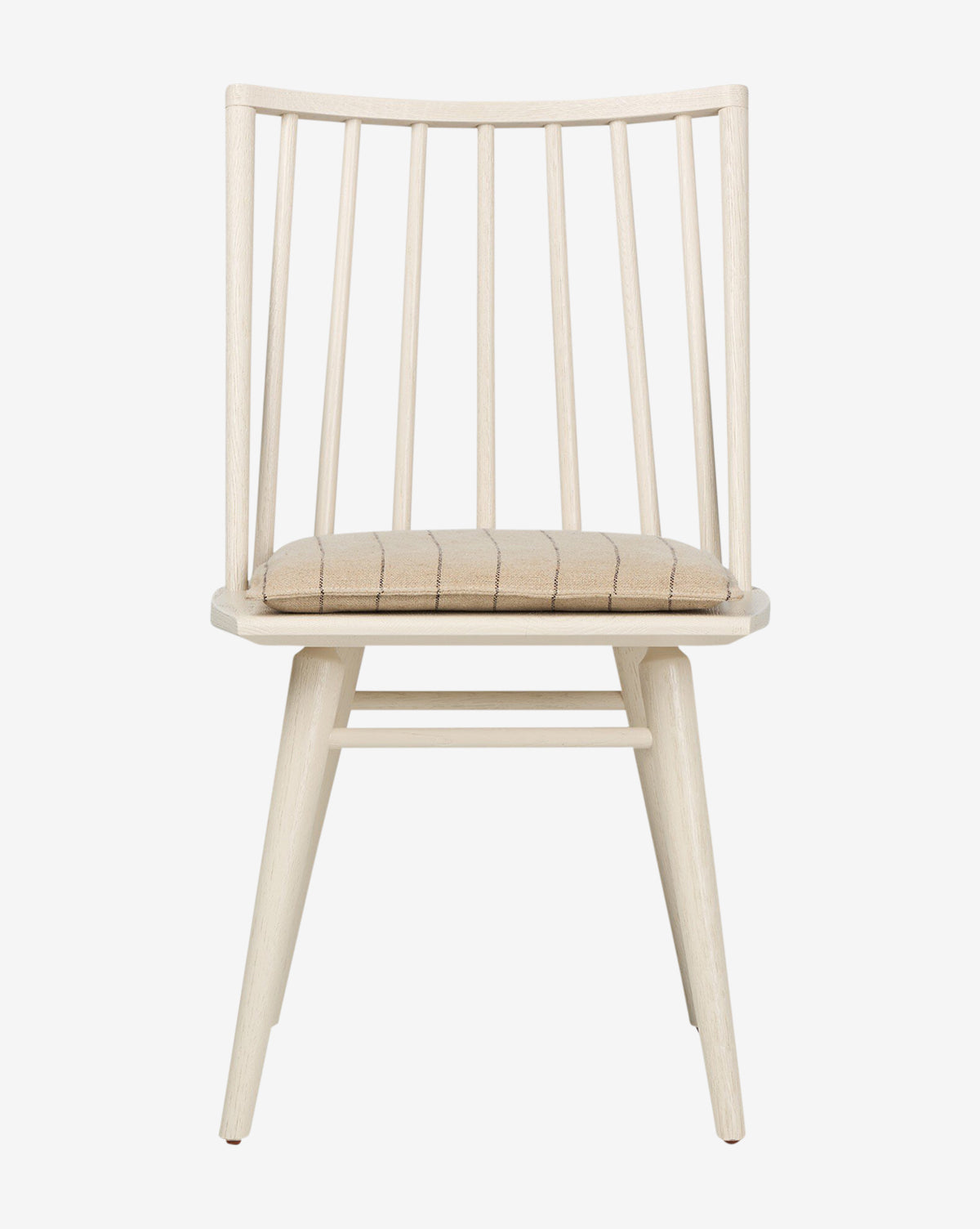 The Madison Dining Chair features a light oak finish, spindle backrest, four angled legs, and a beige cushioned seat, by McGee & Co. Photographed from the front against a plain white background.