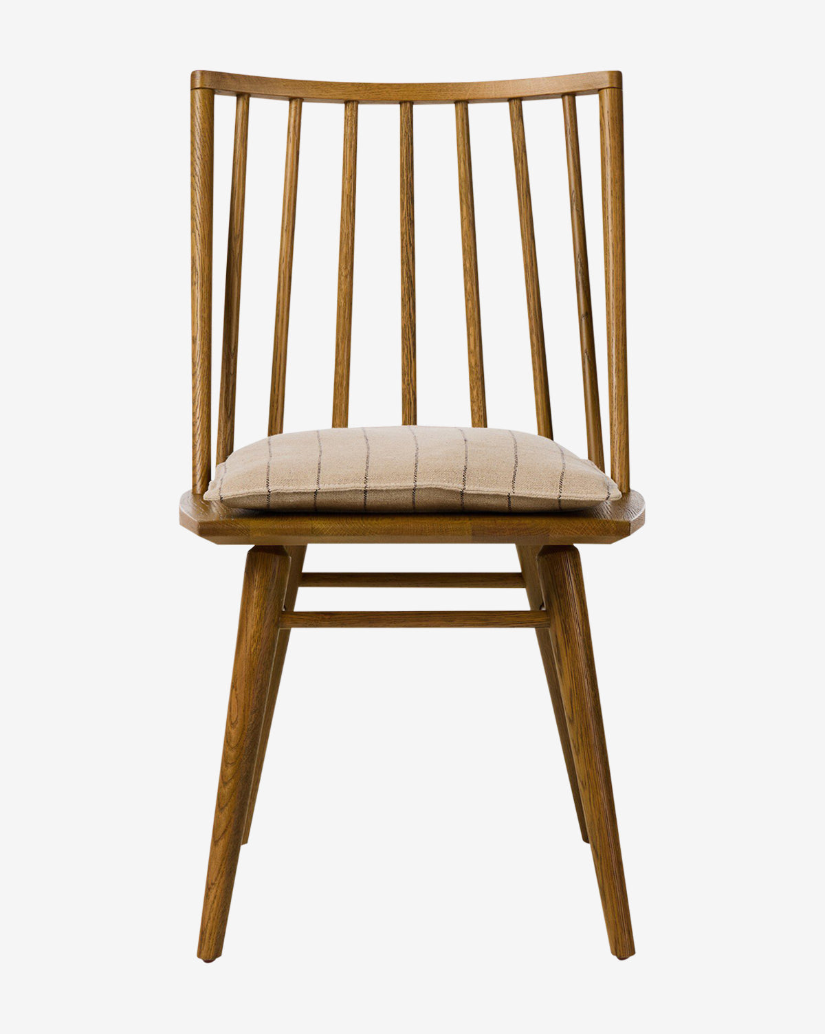 The Madison Dining Chair features a slatted backrest, angled legs, and a beige cushioned seat in a simple modern design, shown against a plain white background by McGee & Co.