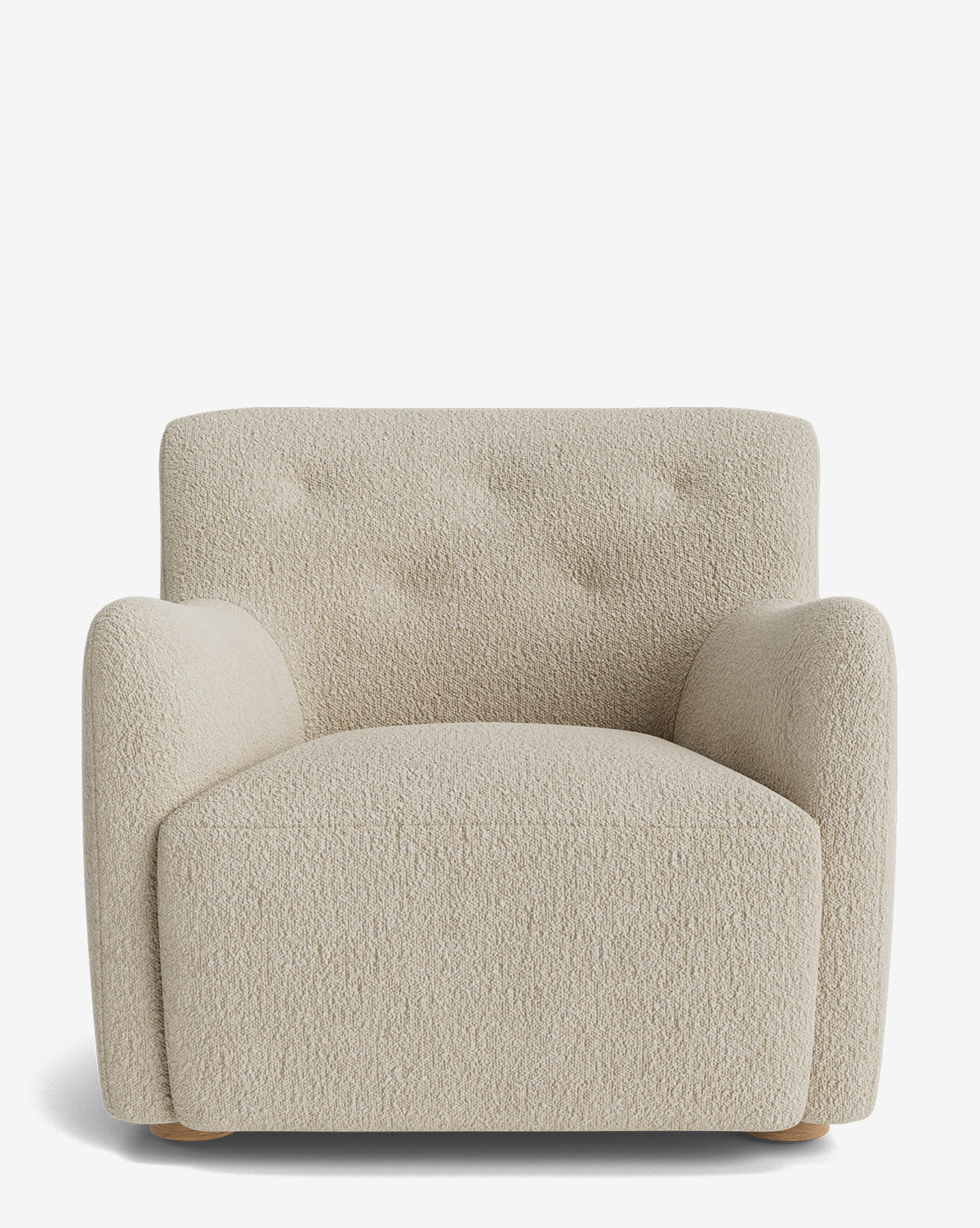 The Magda Lounge Chair is a plush, cream-colored seat with rounded arms, tufted backrest, and wooden feet. It features textured designer upholstery and is shown against a plain white background by McGee & Co.