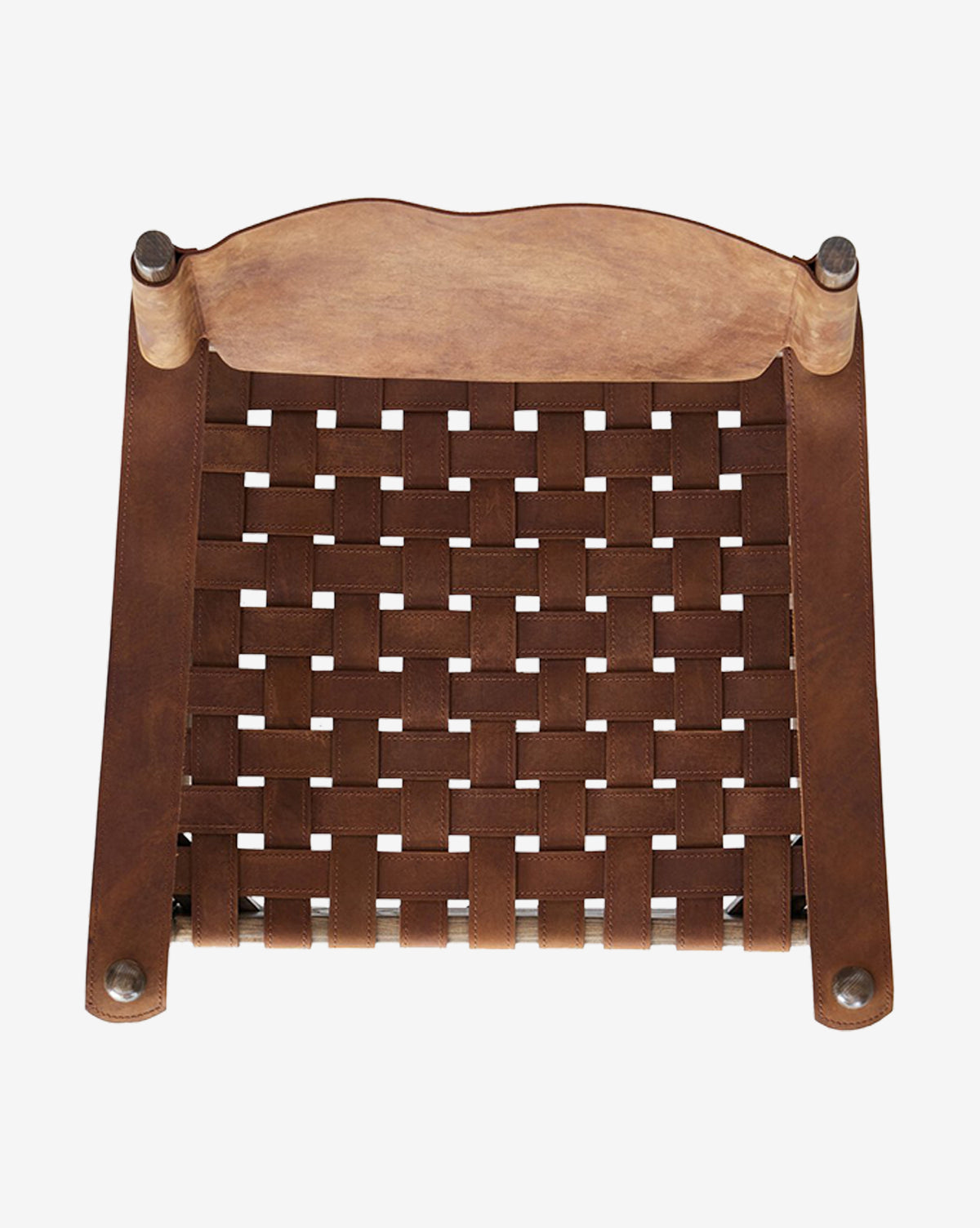 Top view of the Maris Lounge Chair, showcasing brown top-grain leather straps woven together and metal fasteners at each corner for a vintage-inspired style, by McGee & Co.