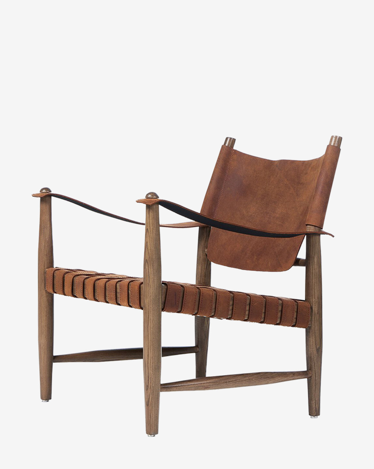 The Maris Lounge Chair features a tan top-grain leather sling backrest, woven leather seat, curved wooden armrests, and a minimalist mid-century modern design with vintage inspiration, by McGee & Co.