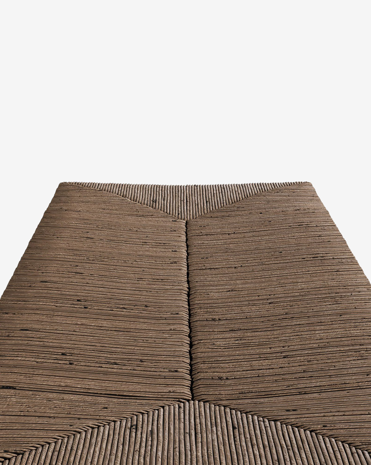 A close-up of the McCarthy Bench shows its geometric, textured brown mat with woven details and symmetrical V-shaped linear patterns, set against a plain white background, by McGee & Co.