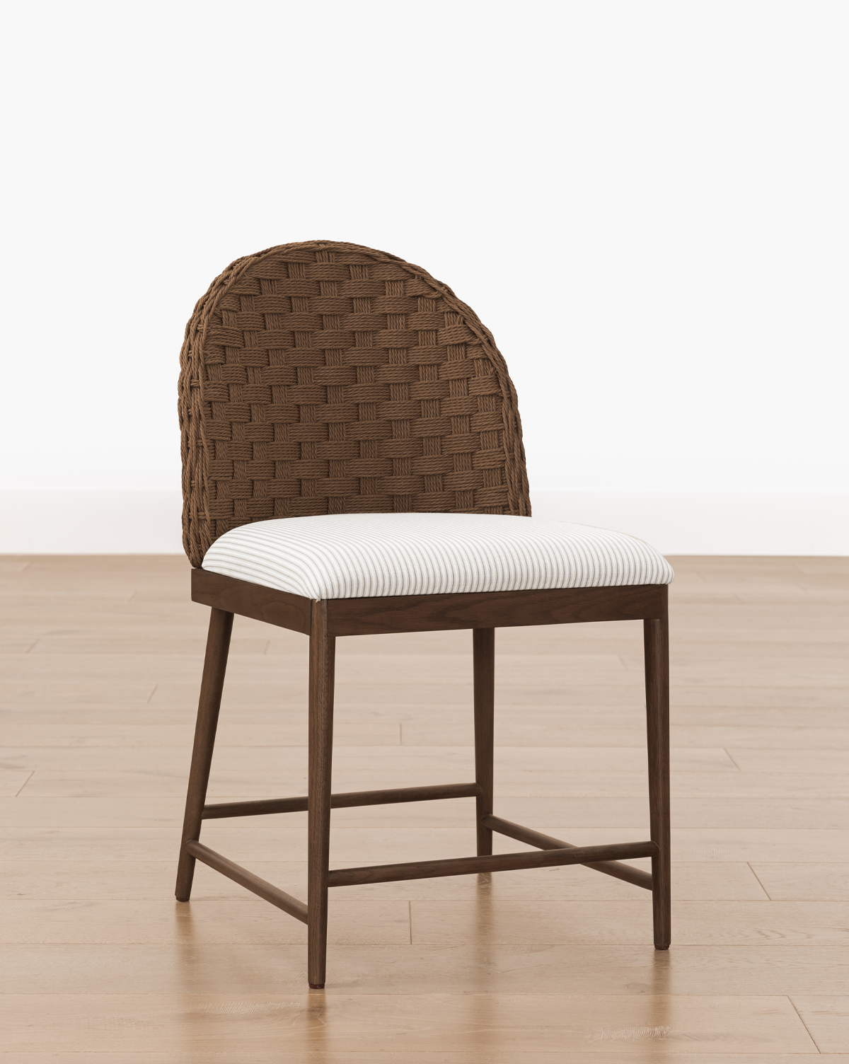 It looks elegant on a light wood floor against a plain white background, by McGee & Co.