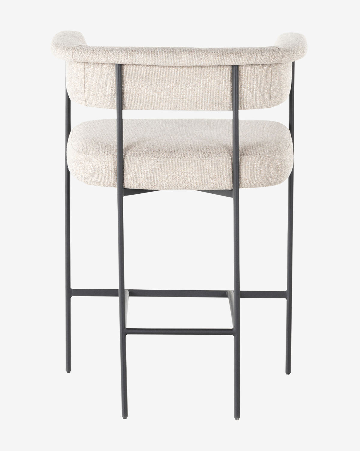 Back view of the Monson Stool, a modern bar stool with a light beige upholstered seat and backrest on a minimalist black metal frame featuring four legs and a footrest, by McGee & Co.
