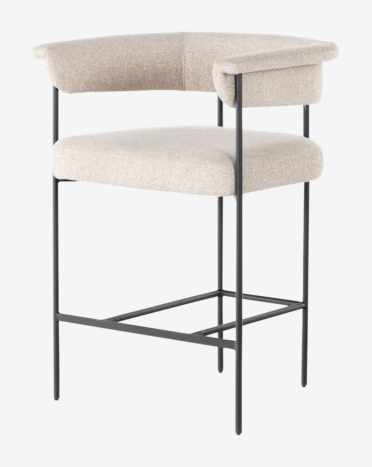 The Monson Stool is a modern bar stool with a curved beige upholstered backrest and seat, set on a minimalist black metal frame featuring slim legs and a square footrest, by McGee & Co.