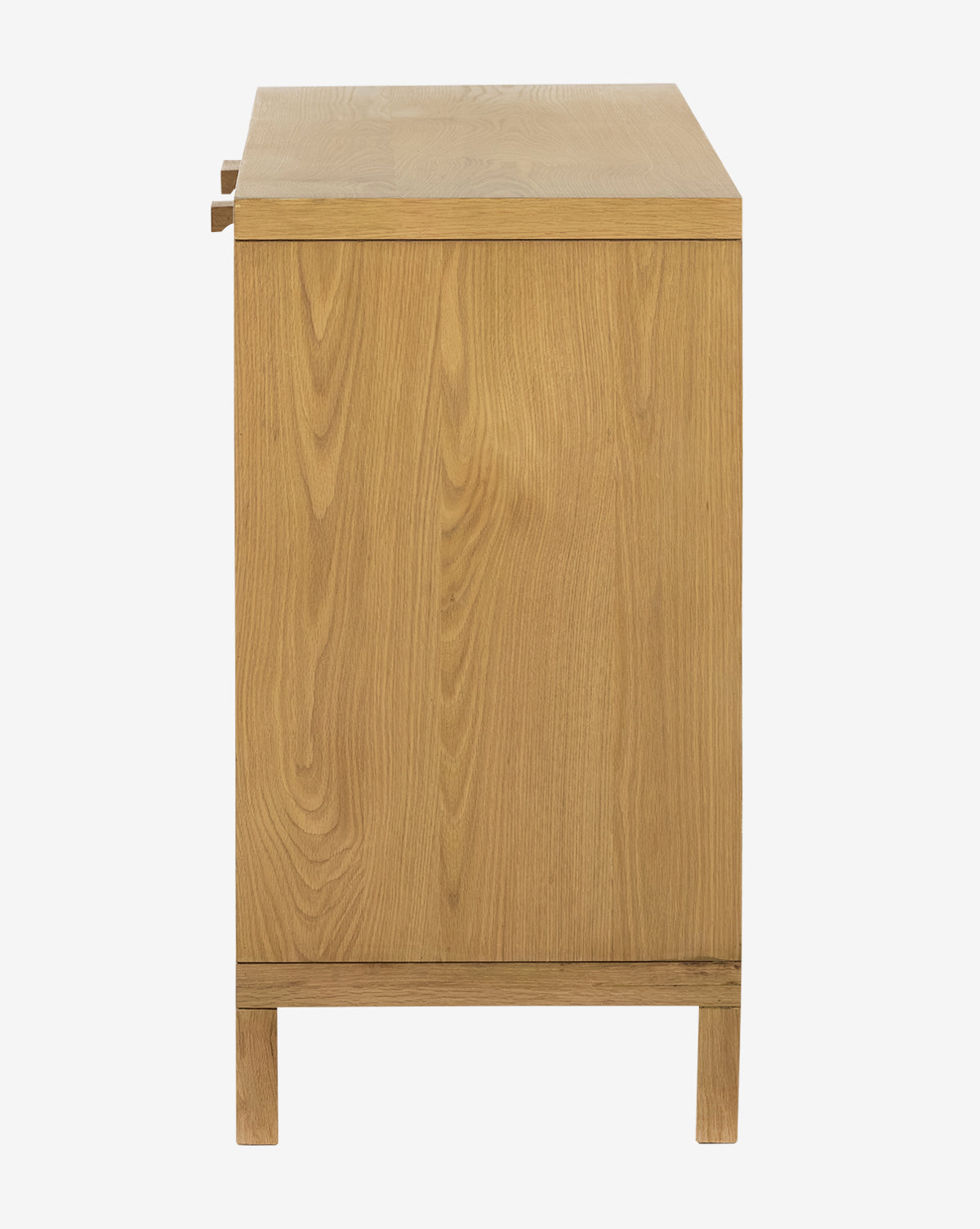 The Mora Sideboard showcases a rectangular silhouette in honey oak with visible wood grain, simple modern design, straight legs, and a handle-free profile when viewed from the side, by McGee & Co.