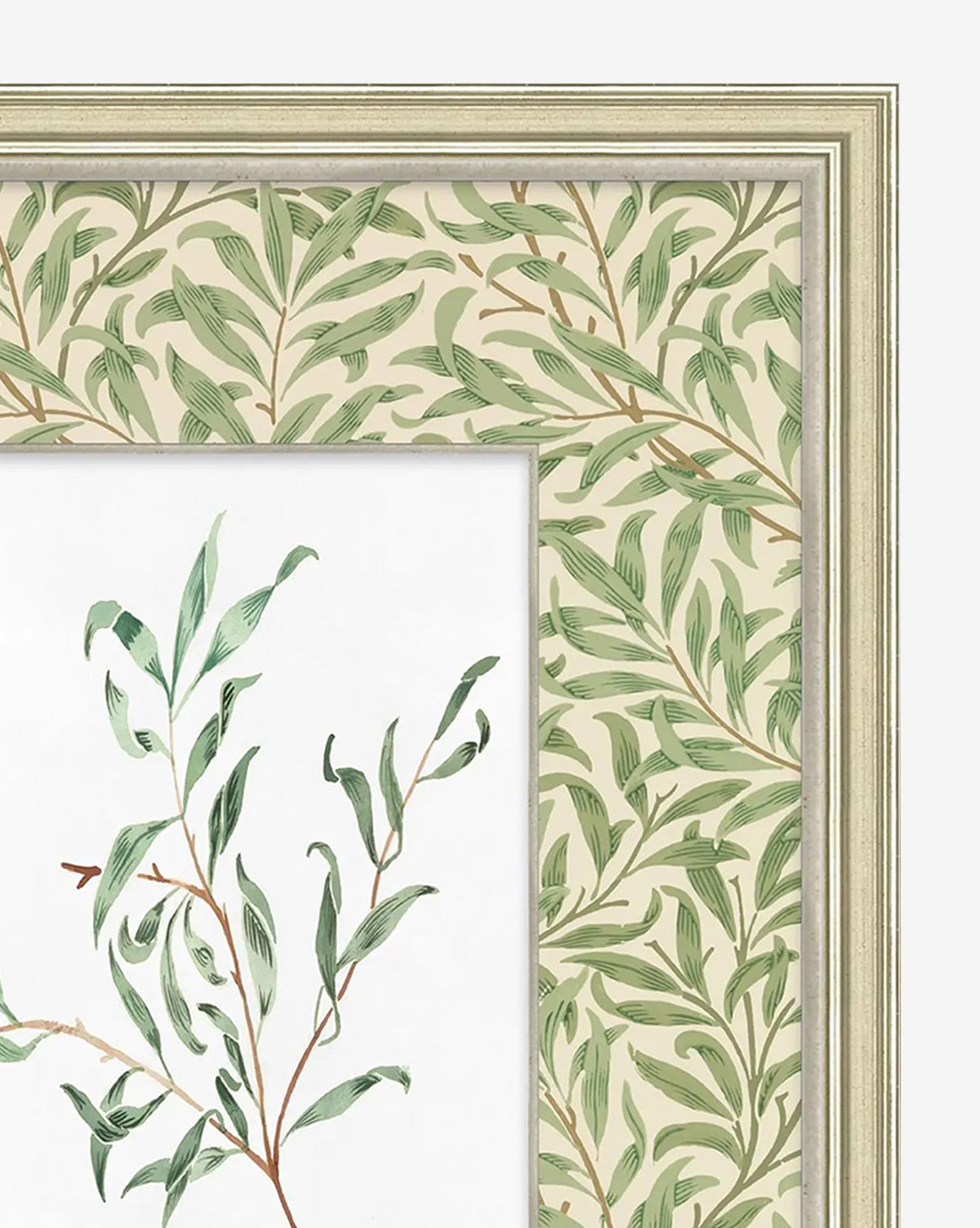 A close-up of the Morris Icon III framed giclee print showcases watercolor-style green leafy branches. The light, subtly textured frame and mat feature a leafy pattern on beige, creating a gallery-quality look, by McGee & Co.