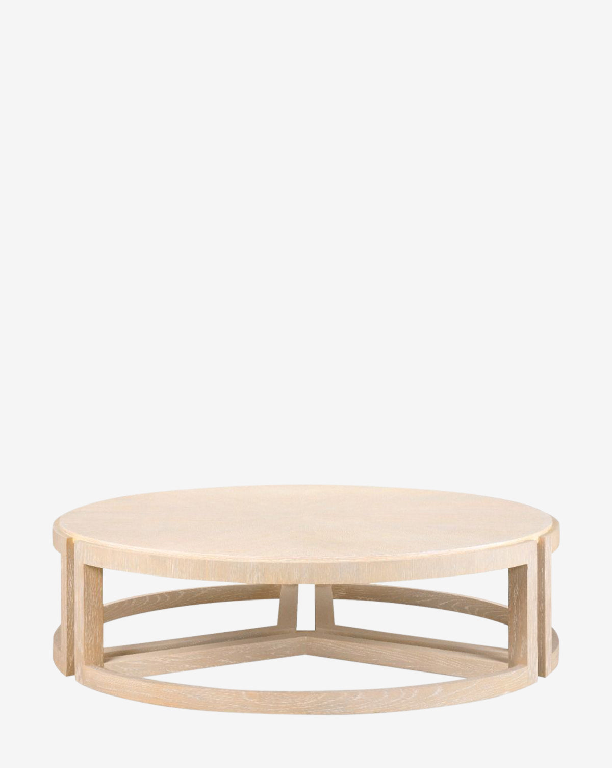 The Morwenna Coffee Table is a round light oak table with an open geometric base, displayed against a plain white background by McGee & Co.