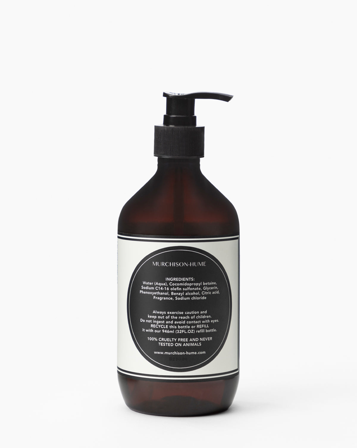 A dark amber pump bottle of Murchison-Hume Hand Soap with a white label listing ingredients such as shea butter, warnings, a cruelty-free notice, website info, and a full ingredients list on a plain white background.