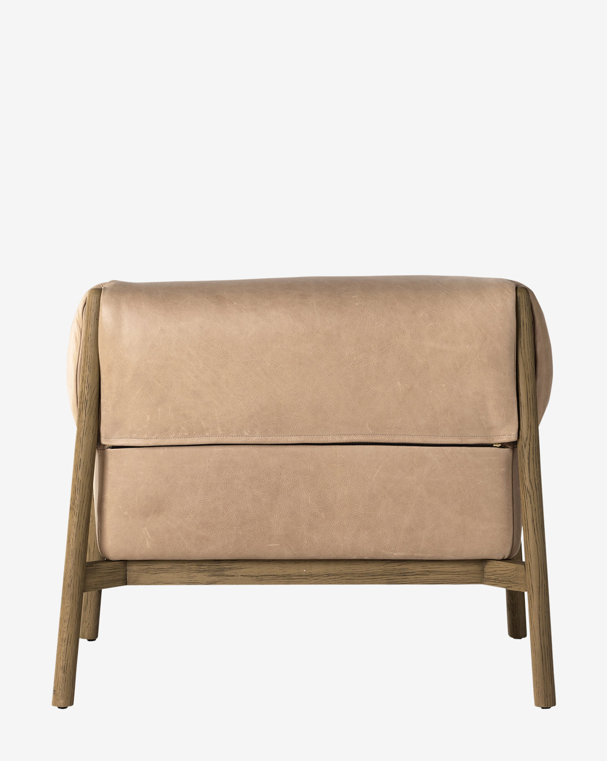 The Nadine Lounge Chair features light brown leather upholstery and a solid oak frame, shown from the front against a plain white background, by McGee & Co.