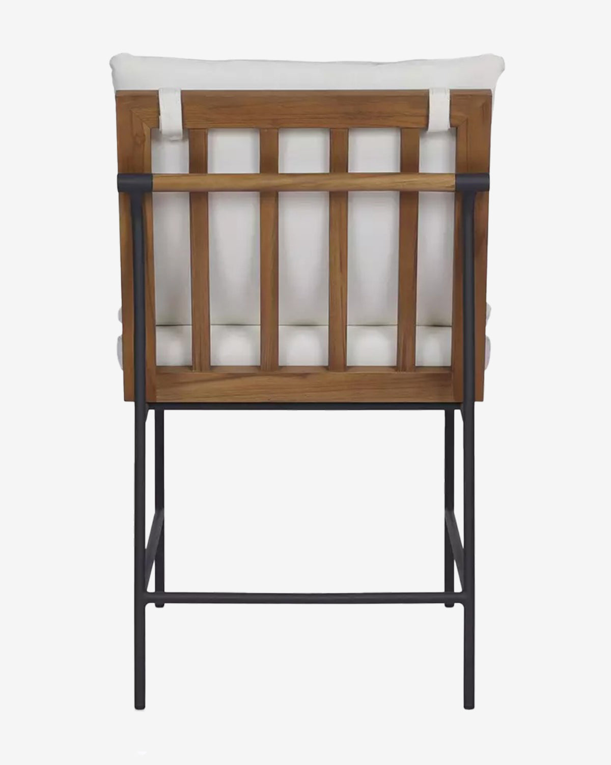 The Neal Outdoor Dining Chair features a teak frame, white performance fabric cushions on the seat and back, and black metal legs, shown from the back, by McGee & Co.