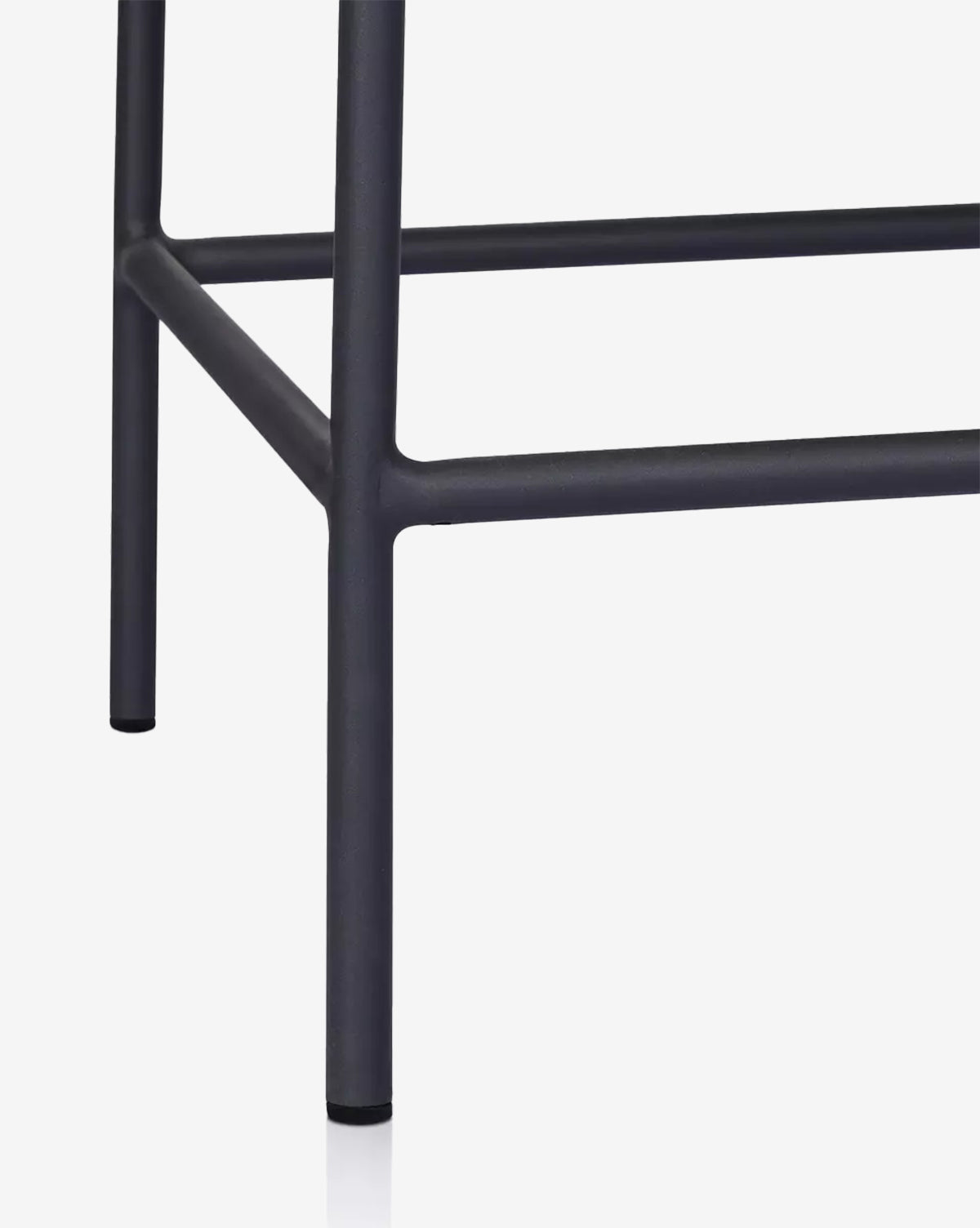 Close-up view of the black metal legs and crossbars of the Neal Outdoor Dining Chair, possibly with a teak frame, set against a plain white background, by McGee & Co.