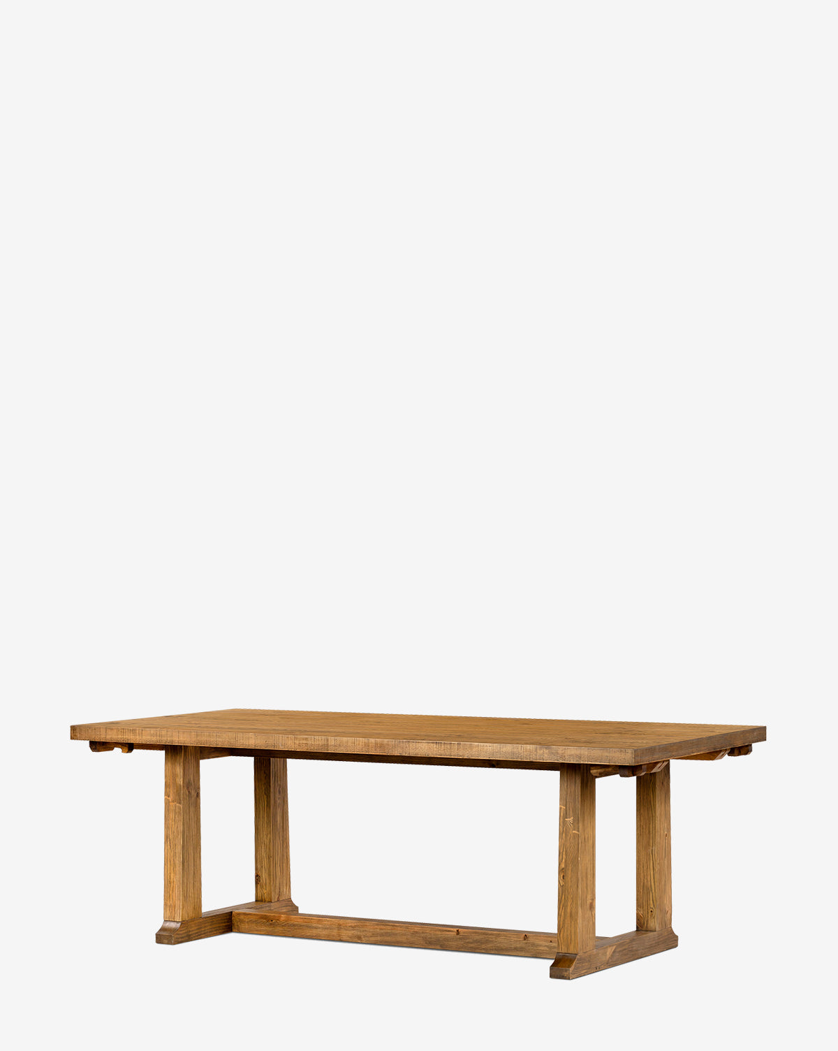 The Niran Extension Dining Table is a rectangular farmhouse-style piece made from solid pine, with a thick top and sturdy block legs joined by a support beam, shown on a plain white background by McGee & Co.