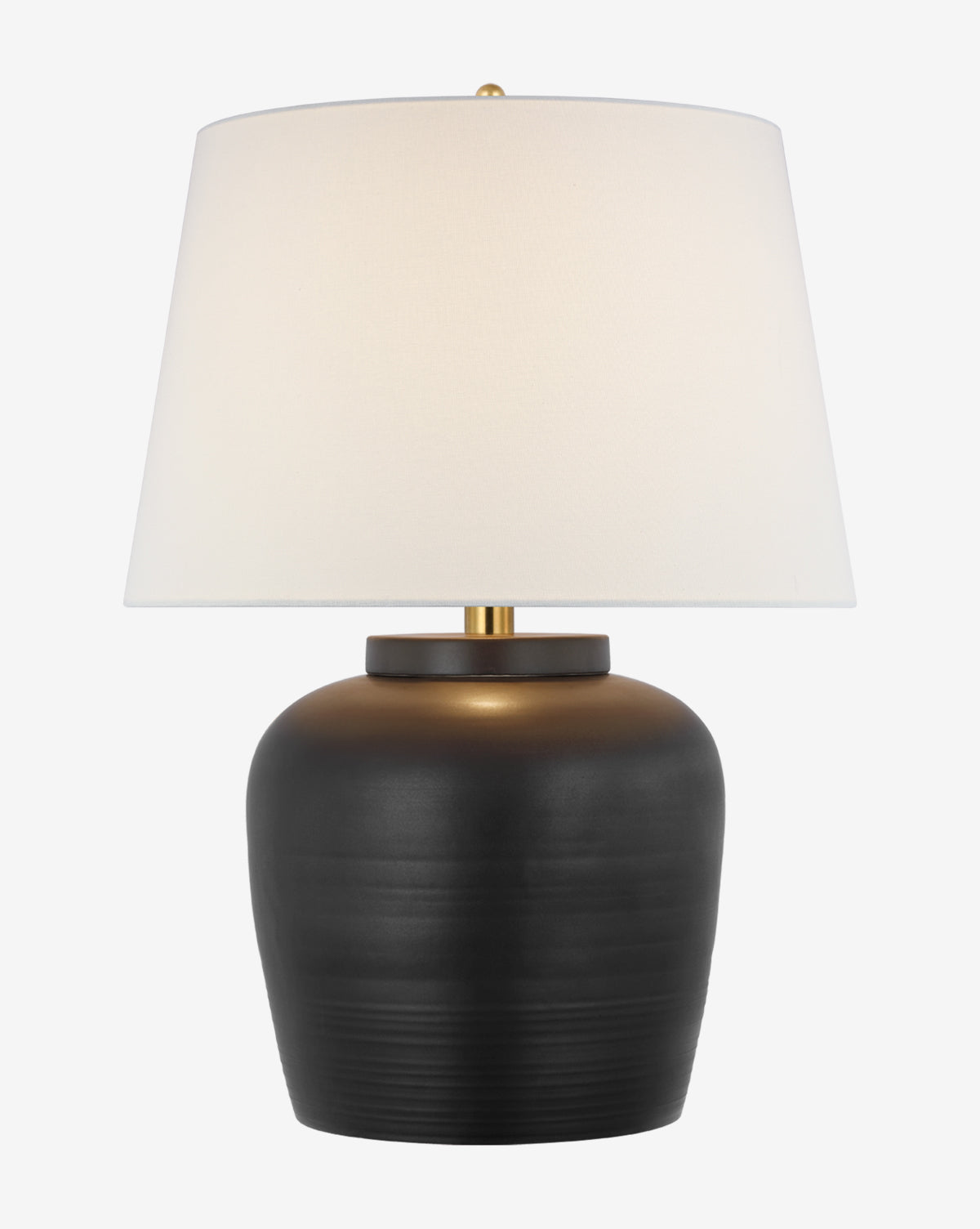 The Nora Table Lamp features a matte black ceramic base, wide white linen shade, and a gold accent atop the base for a simple, elegant look by McGee & Co.