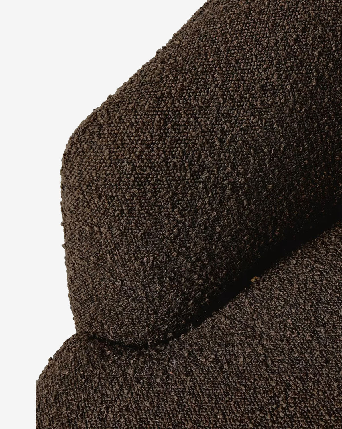 Close-up of the Olivette Slipper Chair, showcasing the elegant curve where seat and backrest meet and its tightly woven, textured upholstery. This modern chair stands out against a clean white background, by McGee & Co.