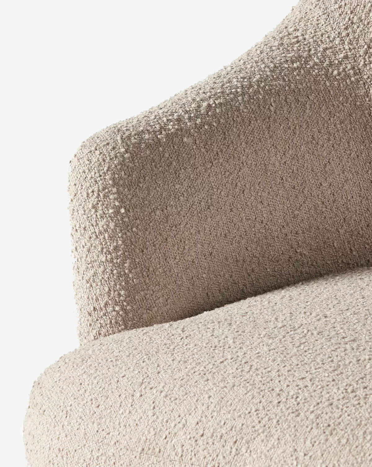 Close-up of the Olivette Slipper Chair, a beige accent chair with a curved backrest and seat in soft, textured boucle fabric shown against a white background, by McGee & Co.