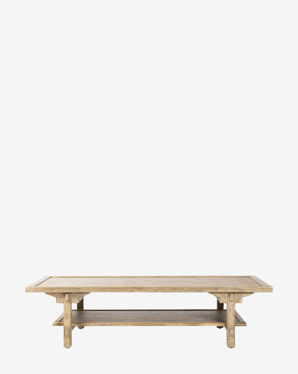 The Orion Coffee Table is a rectangular white oak piece with a natural finish, lower storage shelf, straight legs, and subtly flared tabletop edges, by McGee & Co. Displayed against a plain white background.