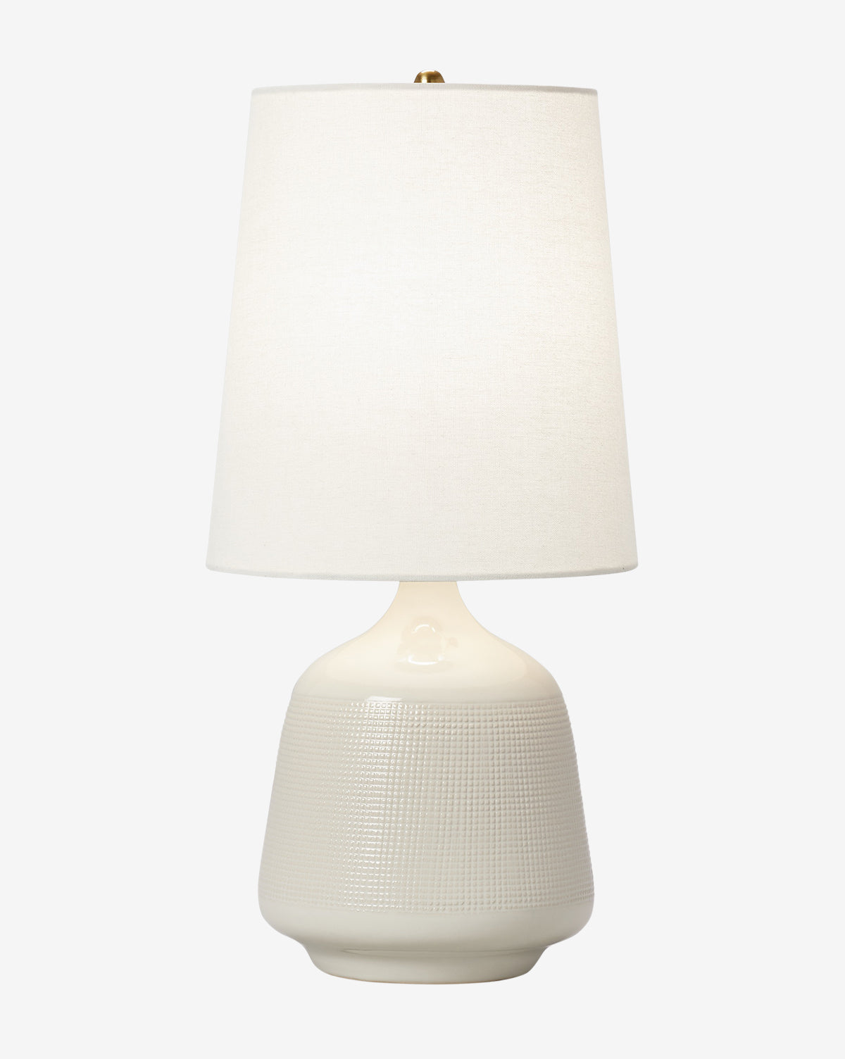 The Ornella Table Lamp showcases a textured off-white ceramic base and a white fabric shade, offering an elegant accent for any room, by McGee & Co.