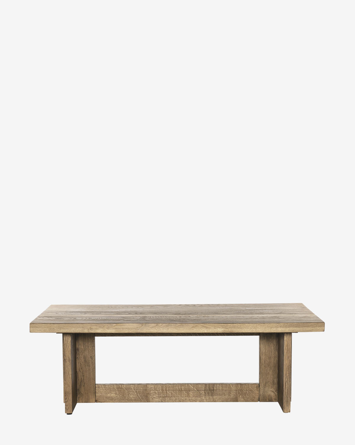 The Ovitt Coffee Table features a simple rectangular design with a flat top and sturdy legs, finished in natural wood. This minimalist living room piece is displayed against a plain white background, by McGee & Co.