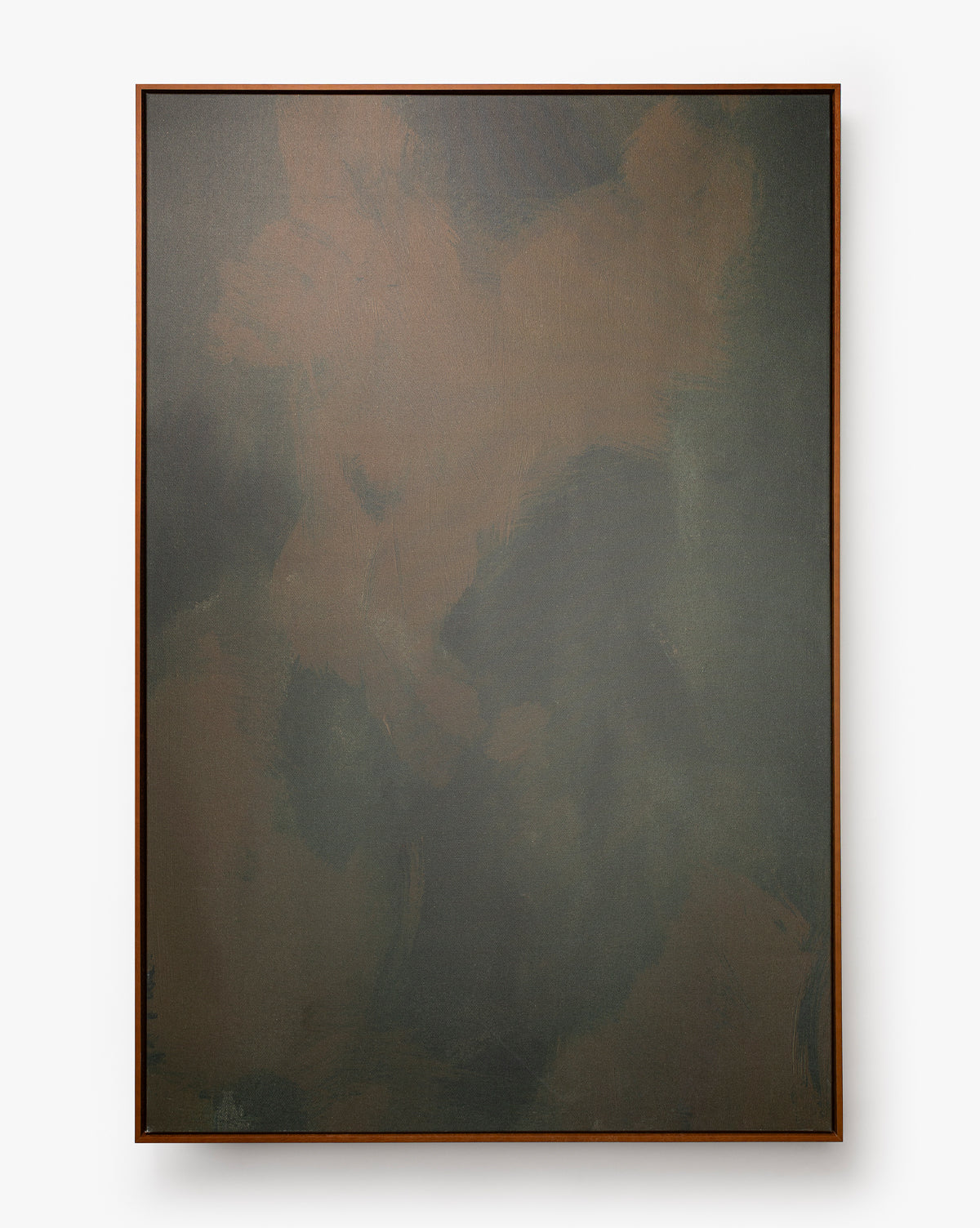 Painters Depths is a framed abstract wall art piece with dark green and brown tones, soft cloudy brushstrokes, and a textured giclee canvas, creating a moody effect against a crisp white background, by McGee & Co.