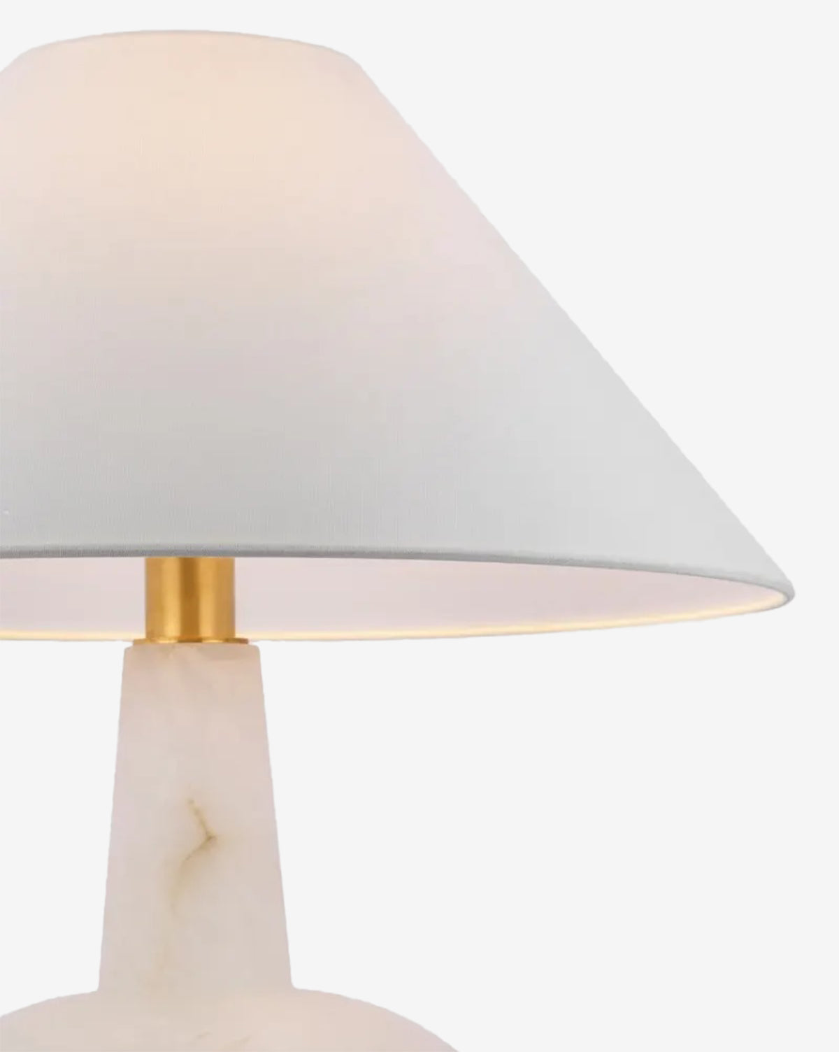 Close-up of the Paros Table Lamp, showcasing its white conical lampshade and marble base with gold accents, evoking alabaster elegance against a plain white background, by McGee & Co.