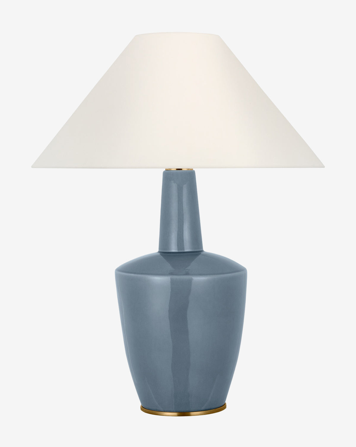 The Paros Table Lamp showcases a glossy blue ceramic base with gold accents and a wide white conical lampshade, displayed on a plain white background by McGee & Co.