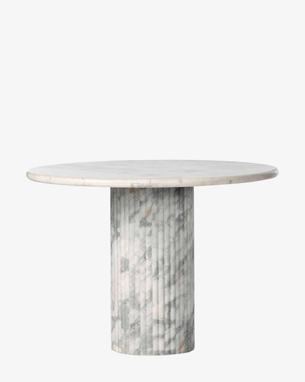 The Patrick Dining Table features a round white marble top with light gray veining and a thick cylindrical base, showcasing refined Italian design, set against a plain white background by McGee & Co.