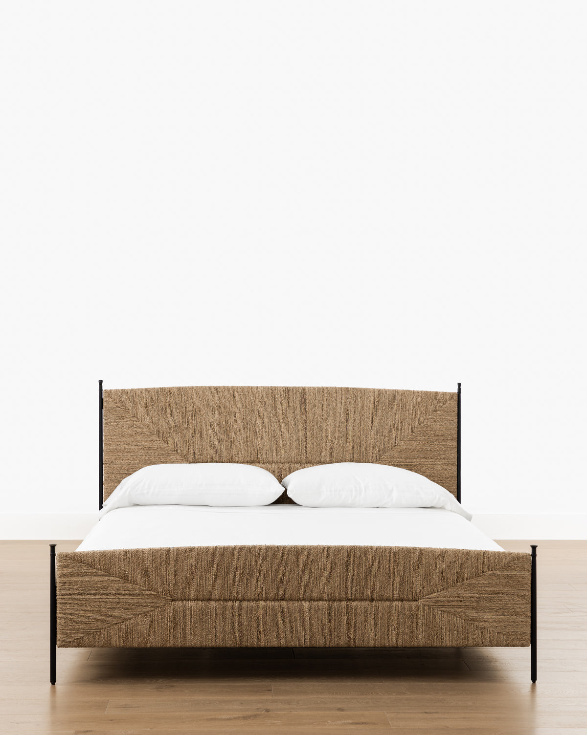 McGee & Co. metal bed frame with seagrass headboard and footboard.