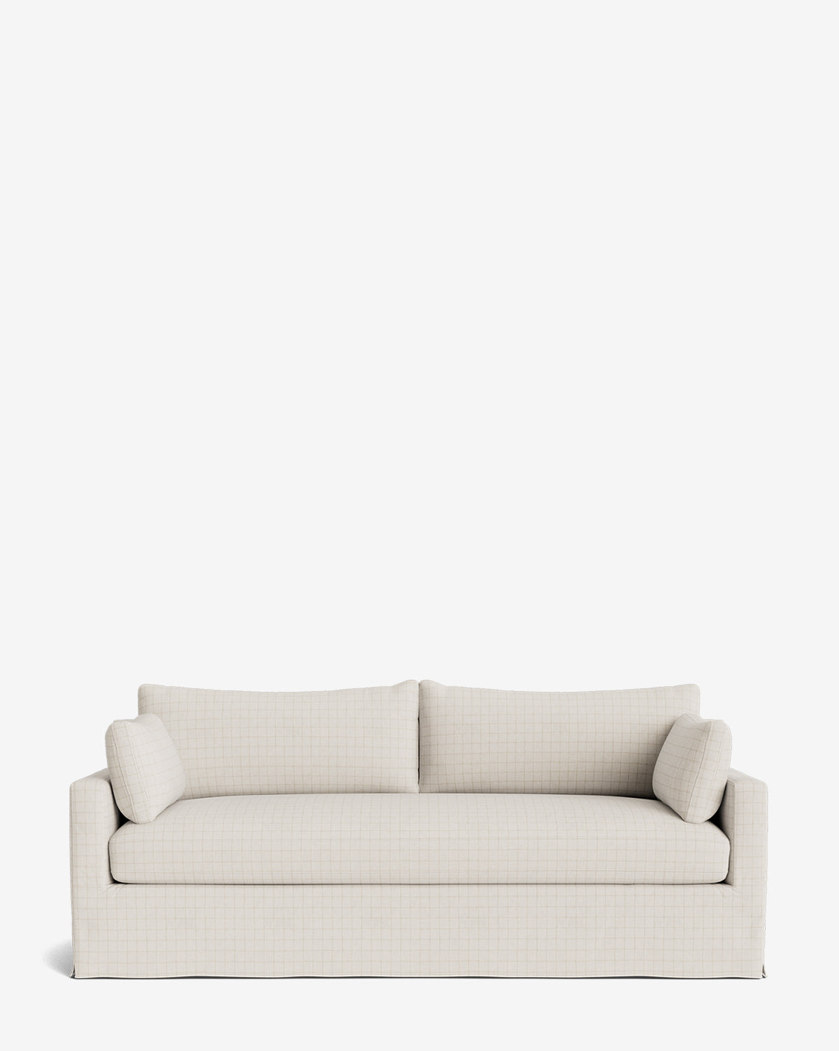 A beige Peterson Classic Slipcover Sofa (75-100) with two feather blend seat cushions, two back cushions, and two bolster pillows is set against a plain white background by McGee & Co.