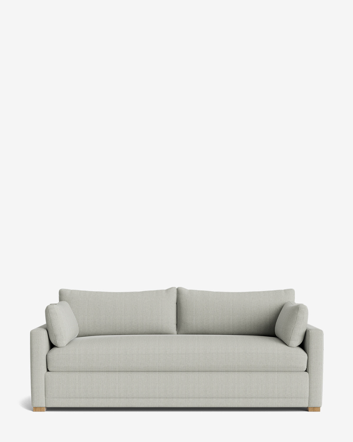 The Peterson Classic Upholstered Sofa (75 - 100) features a light gray handcrafted design with straight arms, plush seat cushions, two back cushions, and matching cylindrical side pillows, shown against a plain white background by McGee & Co.