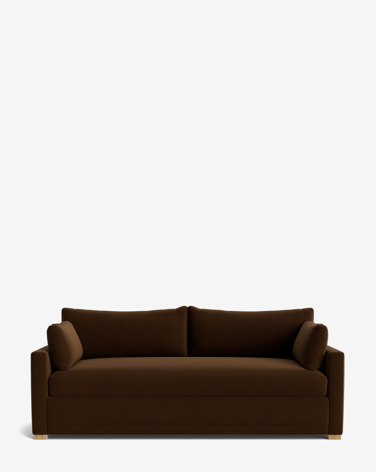 The Peterson Classic Upholstered Sofa (75 - 100) features a modern dark brown design with plush seat and back cushions, matching cylindrical bolster pillows, shown against a plain white background by McGee & Co.