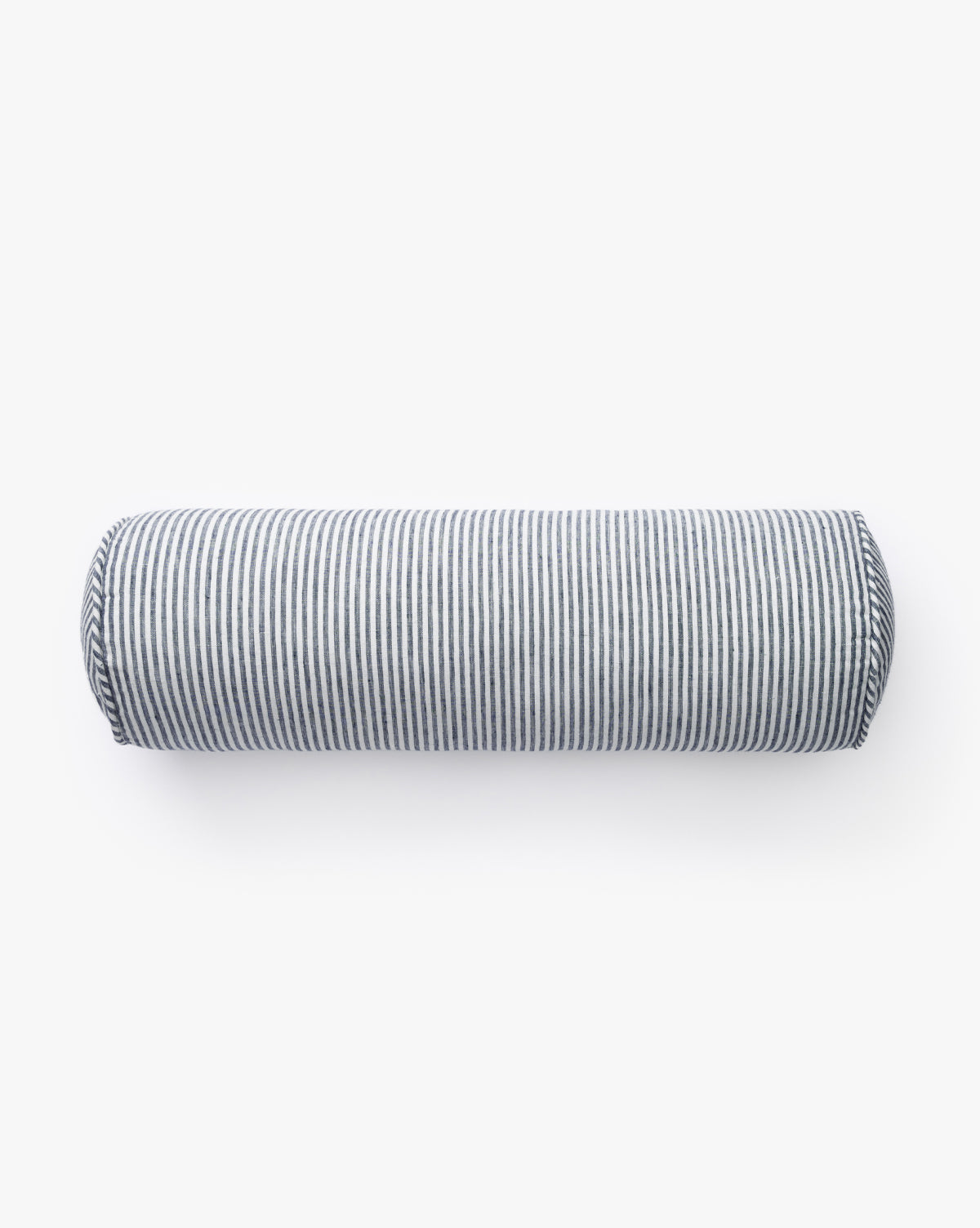 The Pinstripe Bolster Pillow features a cylindrical shape with grey and white vertical stripes in linen, shown on a plain white background, by McGee & Co.
