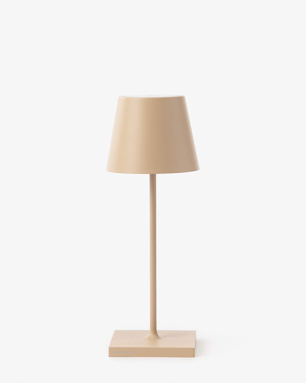 The Poldina Indoor/Outdoor Table Lamp features a minimalist beige design with a conical shade, slim straight stem, and square base, highlighting modern style against a plain white background, by McGee & Co.