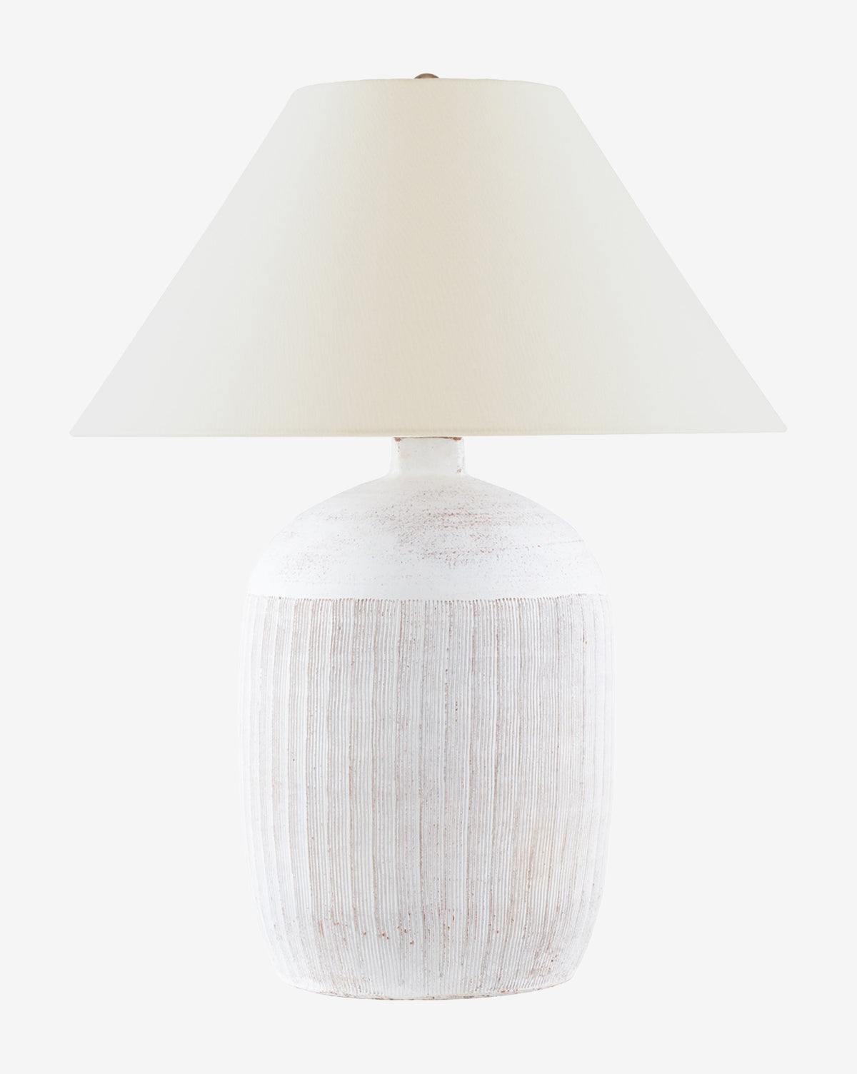 The Portis Combed Round Table Lamp features a textured white ceramic base and a wide, cream-colored tapered lampshade, shown against a plain white background, by McGee & Co.