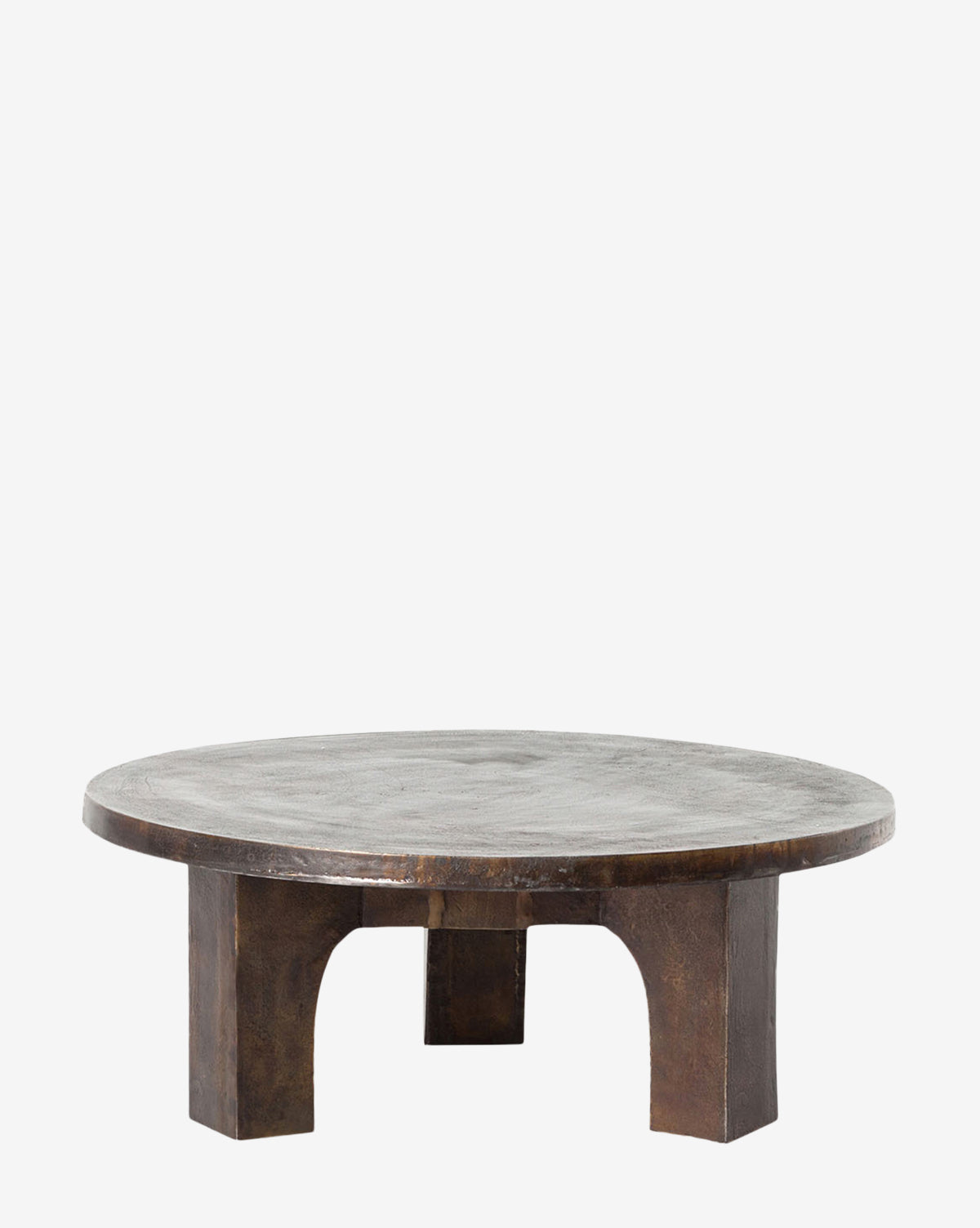 The Pranet Outdoor Coffee Table is a round, dark wood piece with a thick top and three wide block-style legs in an antique rust finish, shown on a plain white background by McGee & Co.