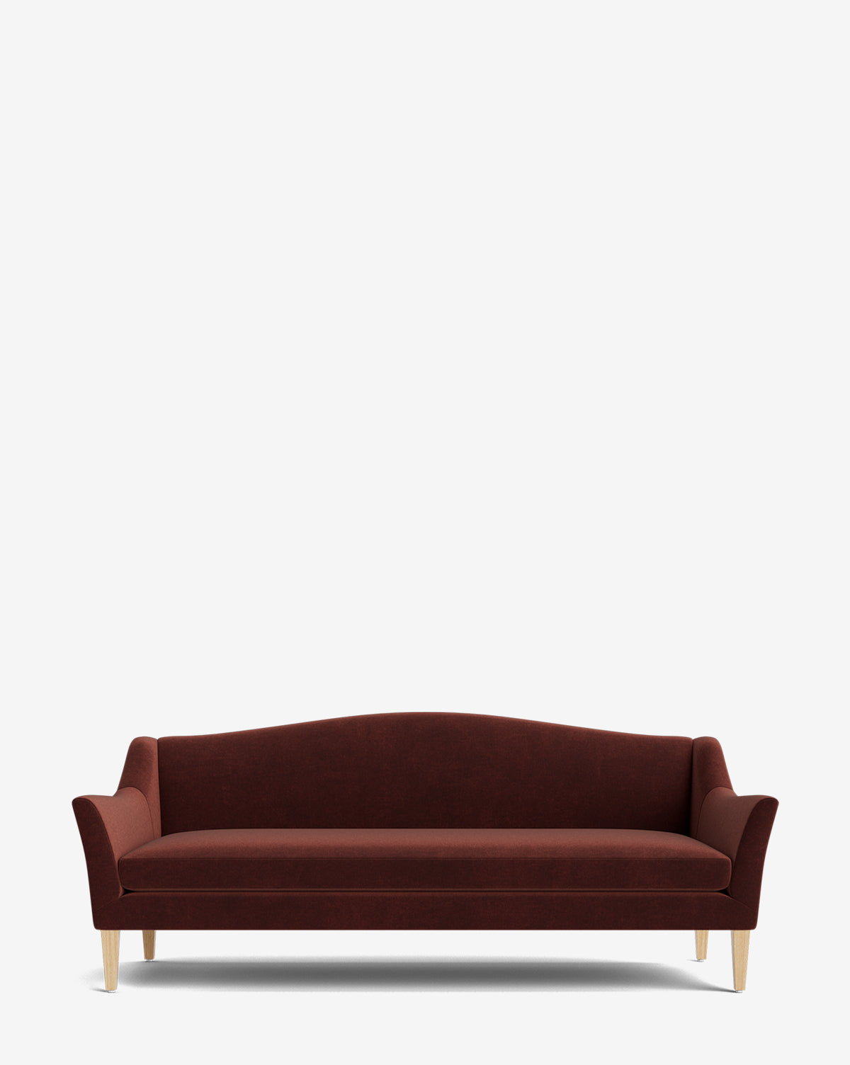 The Prudence Sofa 78 is a modern, burgundy upholstered sofa with slightly flared armrests and light wooden legs, combining a classic silhouette and high-quality fabric against a plain white background by McGee & Co.