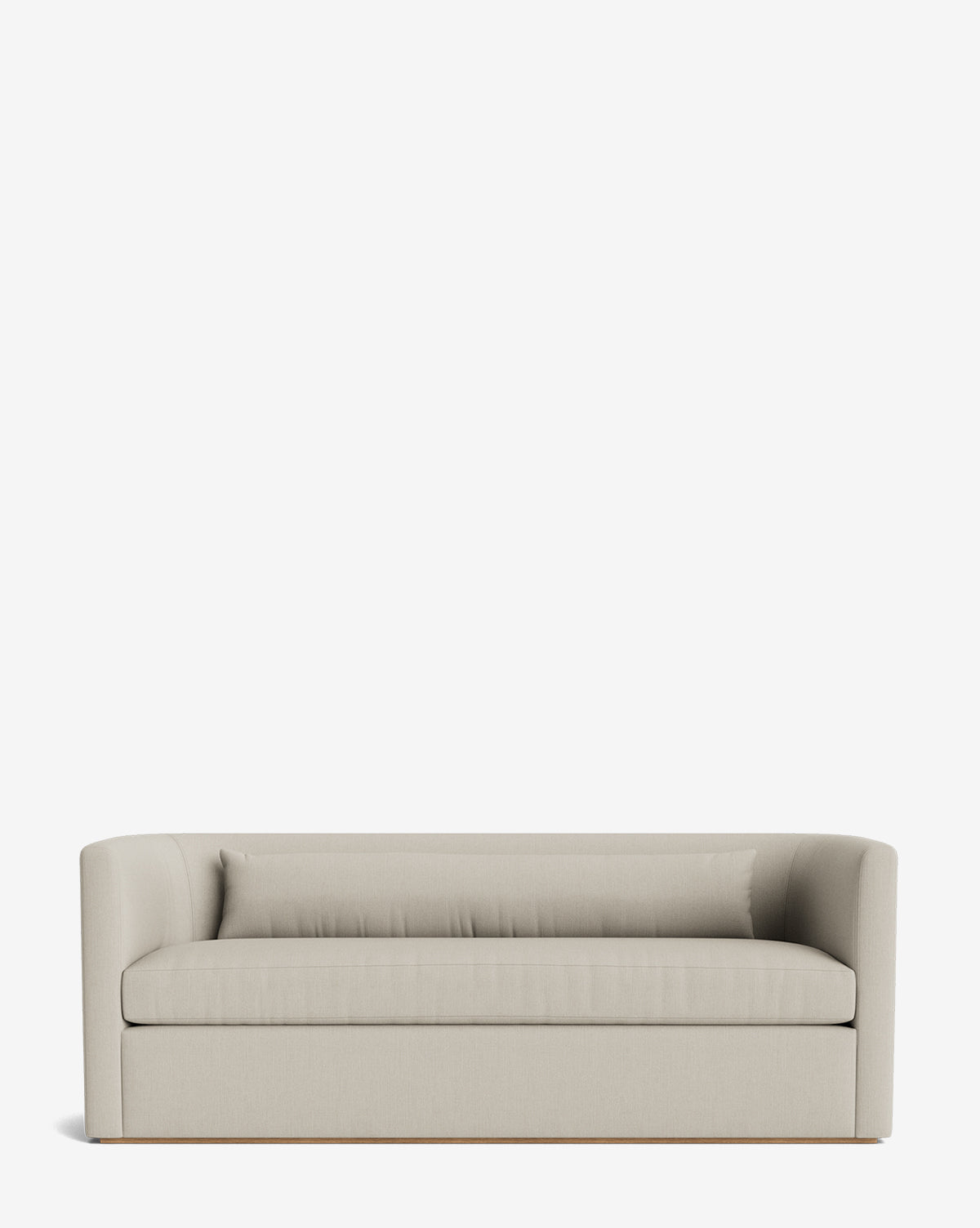 The Reese Sofa (84-96) features down-wrapped cushions, a modern boxy silhouette with curved arms, and a single long seat, all against a plain white background by McGee & Co.