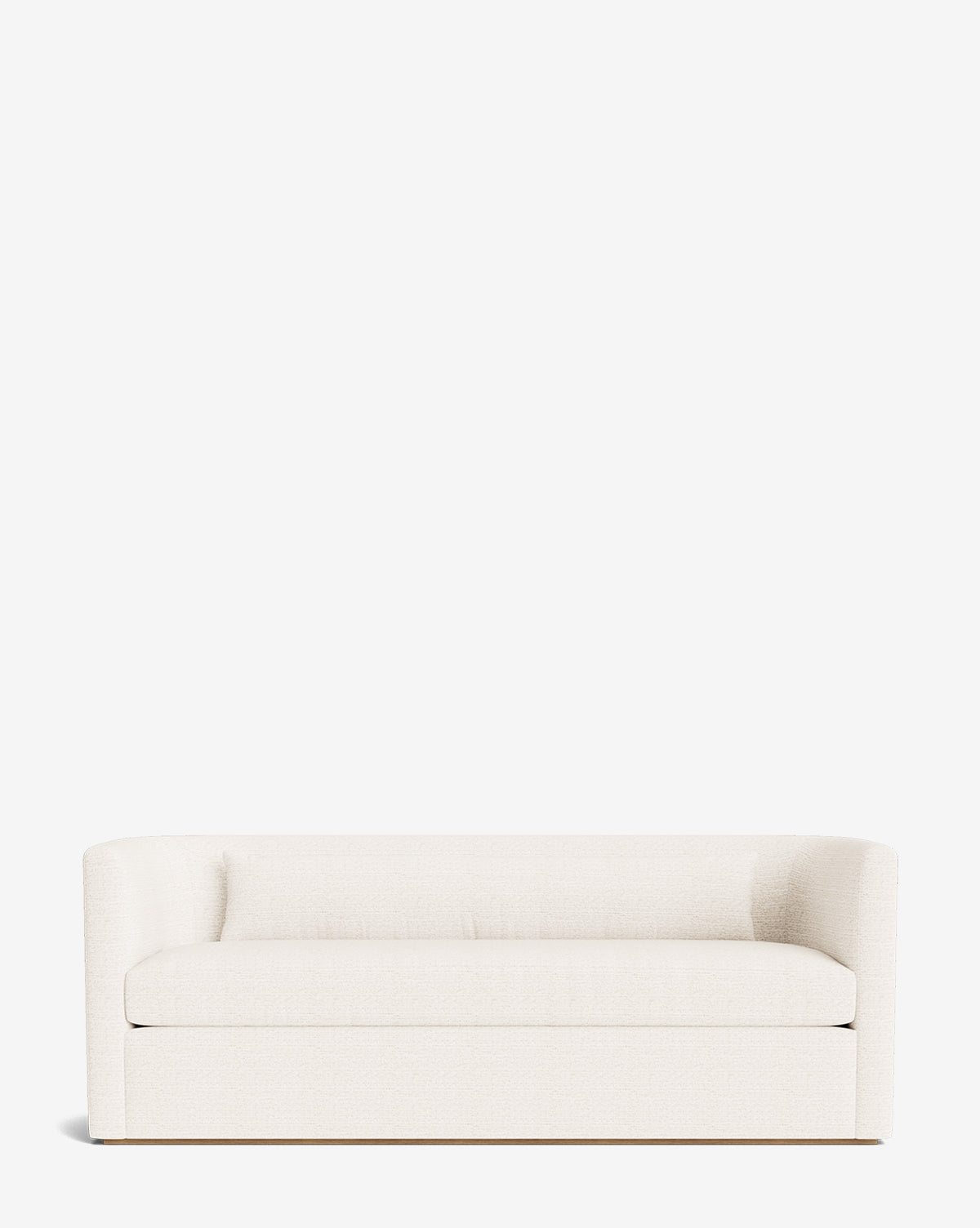 The Reese Sofa (84-96) in cream features curved armrests, down-wrapped cushions on a smooth seat, and handcrafted alder wood legs, set against a plain white background by McGee & Co.